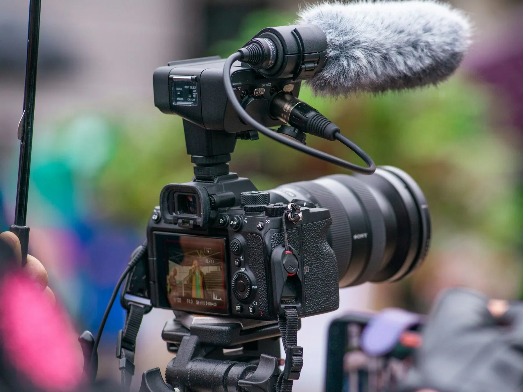 A camera recording a person speaking.